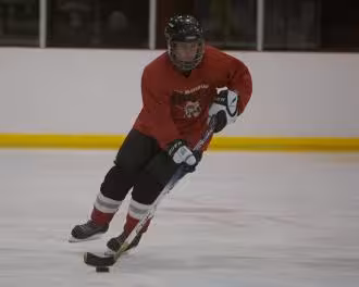 Ryan Hellyer playing ice hockey for the Dunedin Bears
