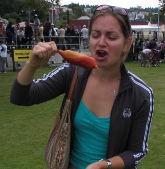 Valerie Paqui munching down the hotdog