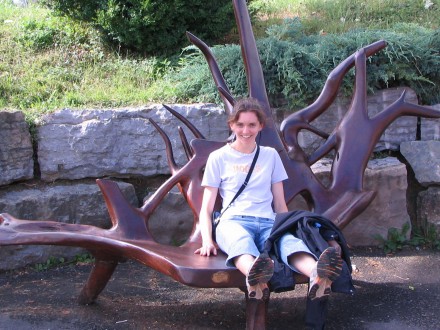 Vicki Argyle on a strange wooden seat at the Speyer transport museum in Germany