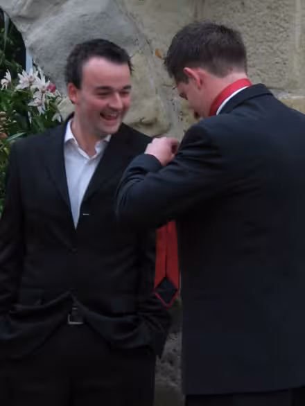 Leigh (left) stoked he got Nick to tie his tie without anyone noticing ...