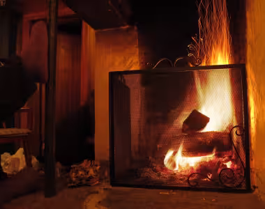 Keeping warm by the fire