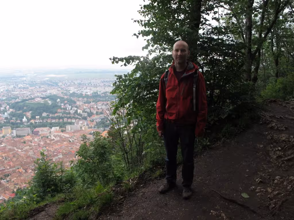 Me standing near the Brașov sign.