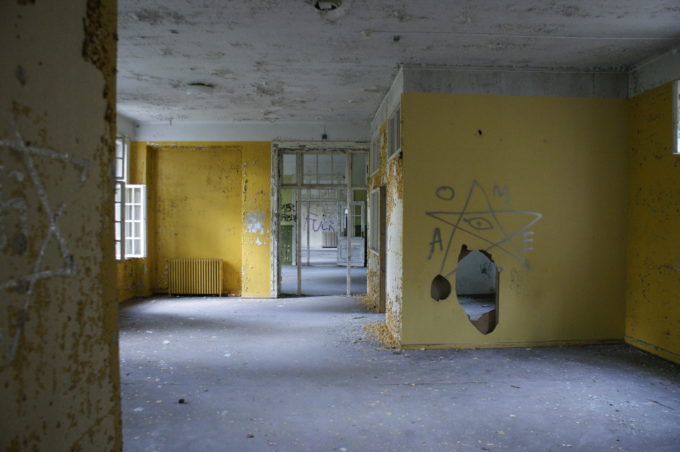 One of many rooms riddled with graffiti