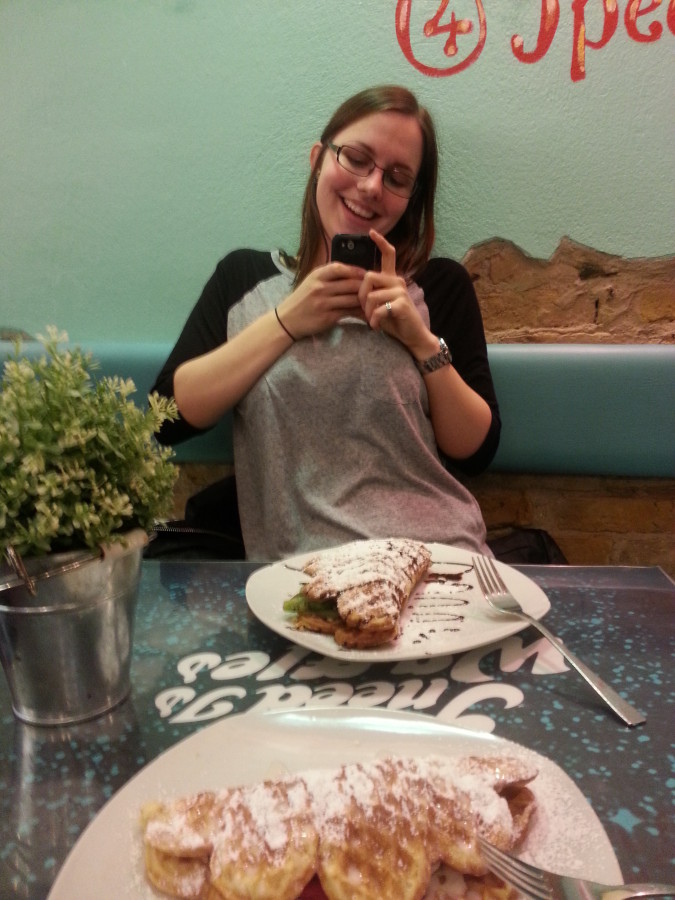 Meta picture of Sara photographing and my kebab photographing her and her kebab.