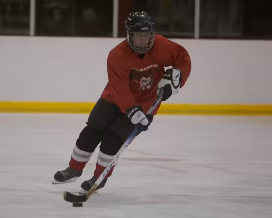 Ryan playing ice hockey